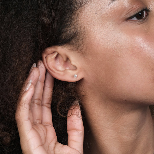 Mela Teeny-Tiny Studs (925 Sterling Silver)